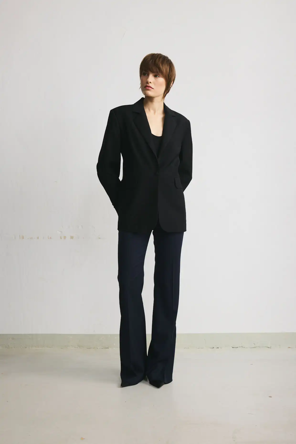 Women’s black wool flared trousers - Image 2