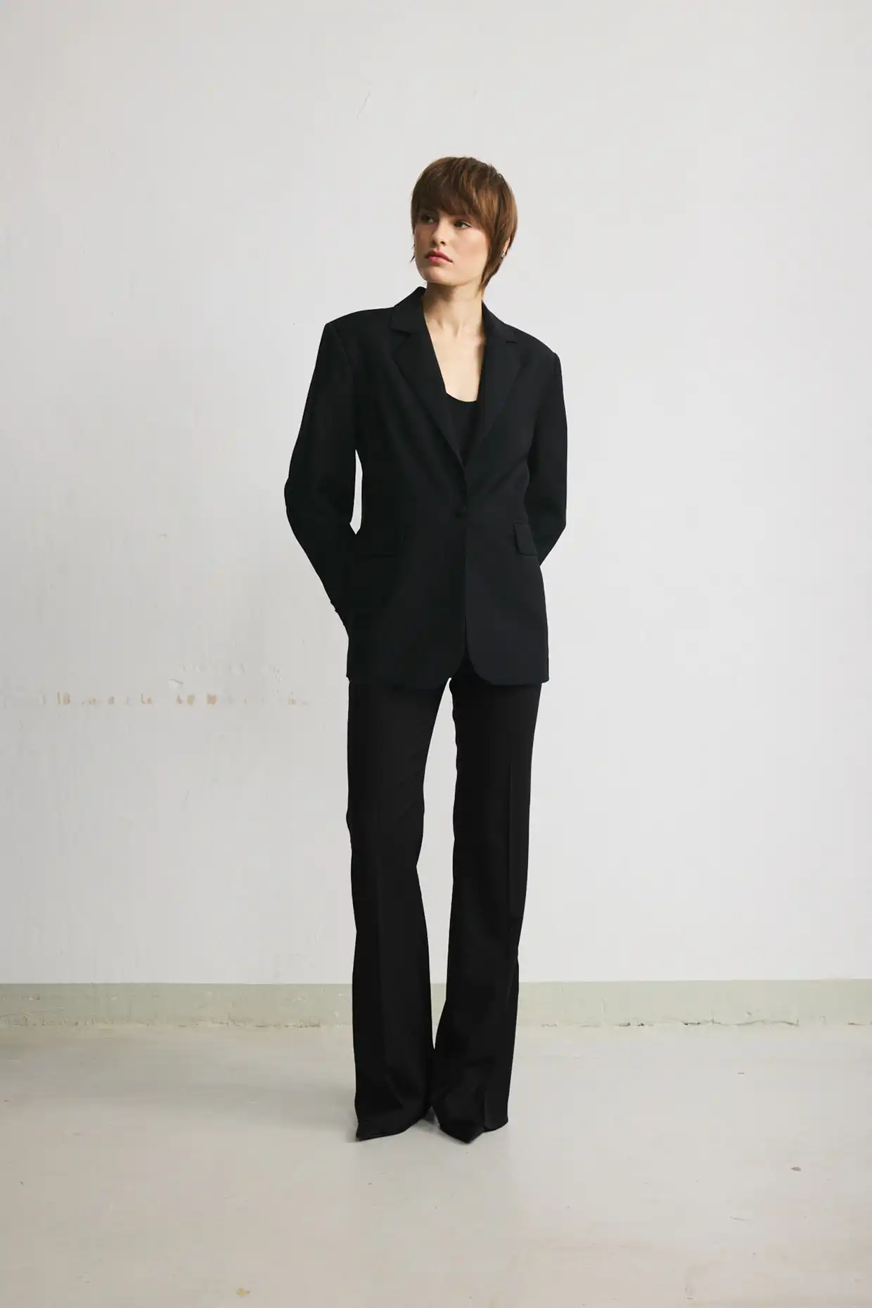 Women’s black wool flared trousers